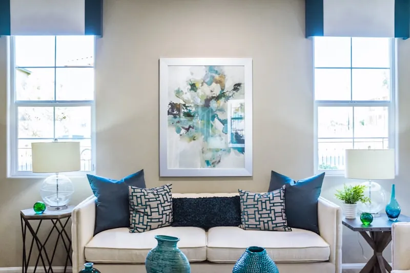 Clean, restored living room with sofa and lamps